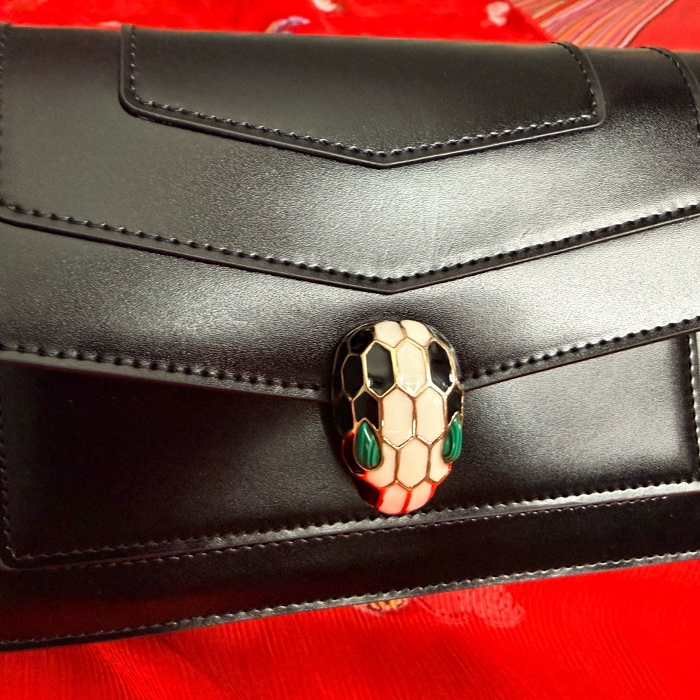 Black Women’s Leather Crossbody Bag with Snake Head Accent